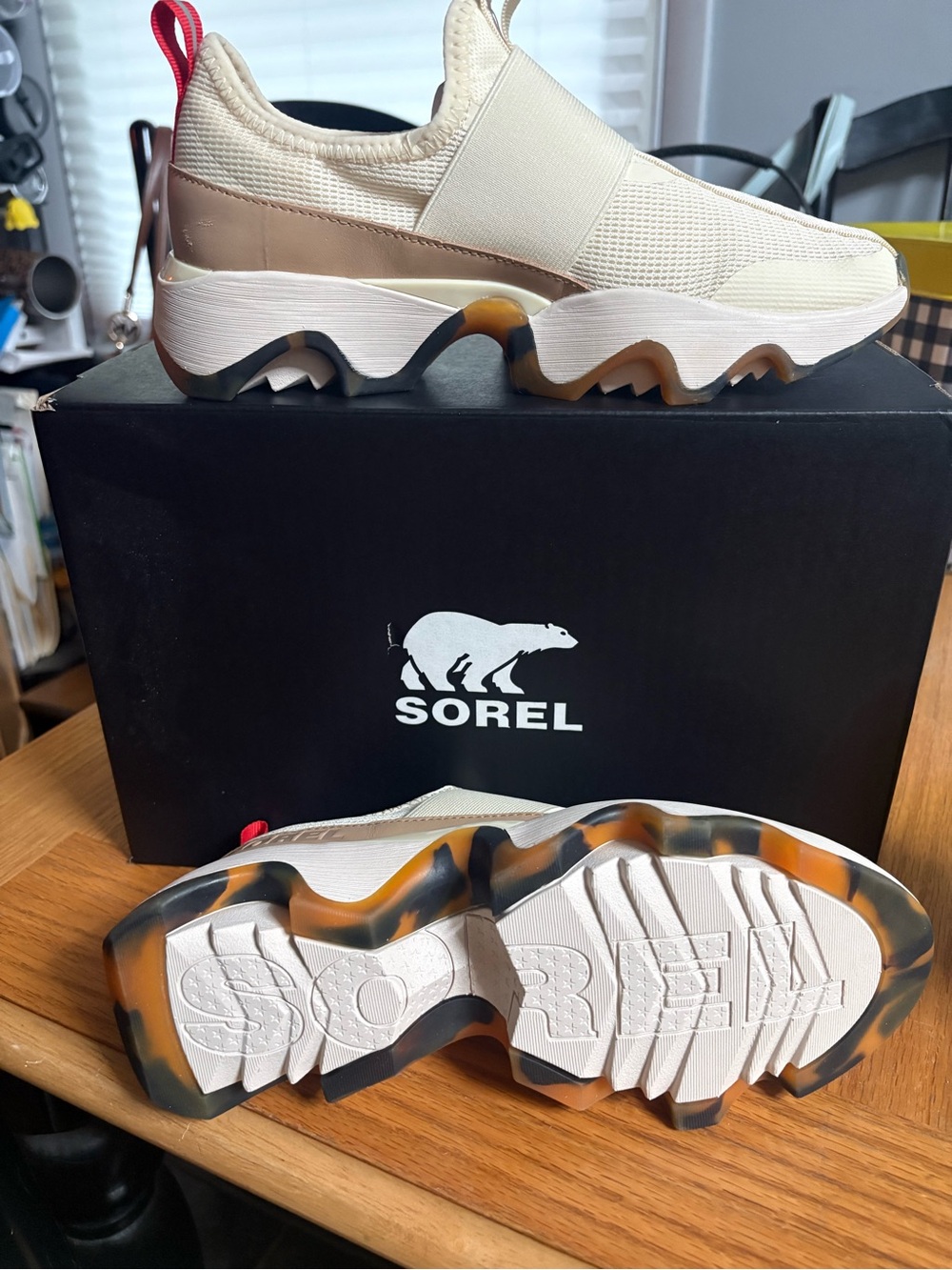 Sorel Cream and CHEETAH print, Gum Wave Sole Slip-On Sneaker with Red Pull Tab